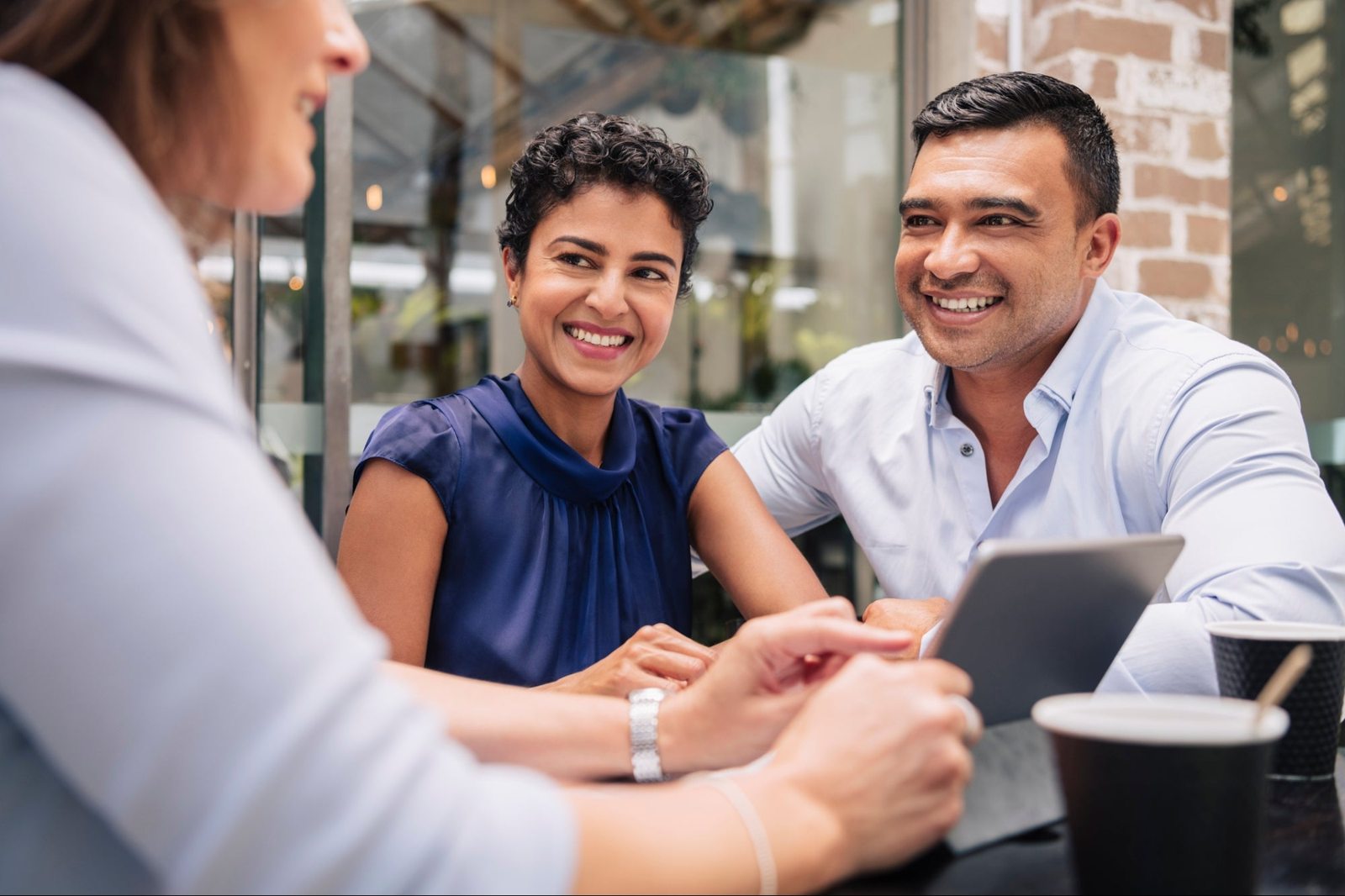 Business owners discussing their plans with an adviser